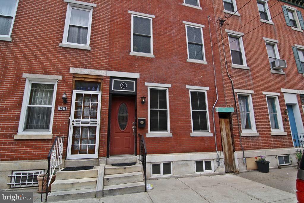 341 Dickinson Street Philadelphia, PA 19147 - Photo 27 of 27 a front view of a multi story building