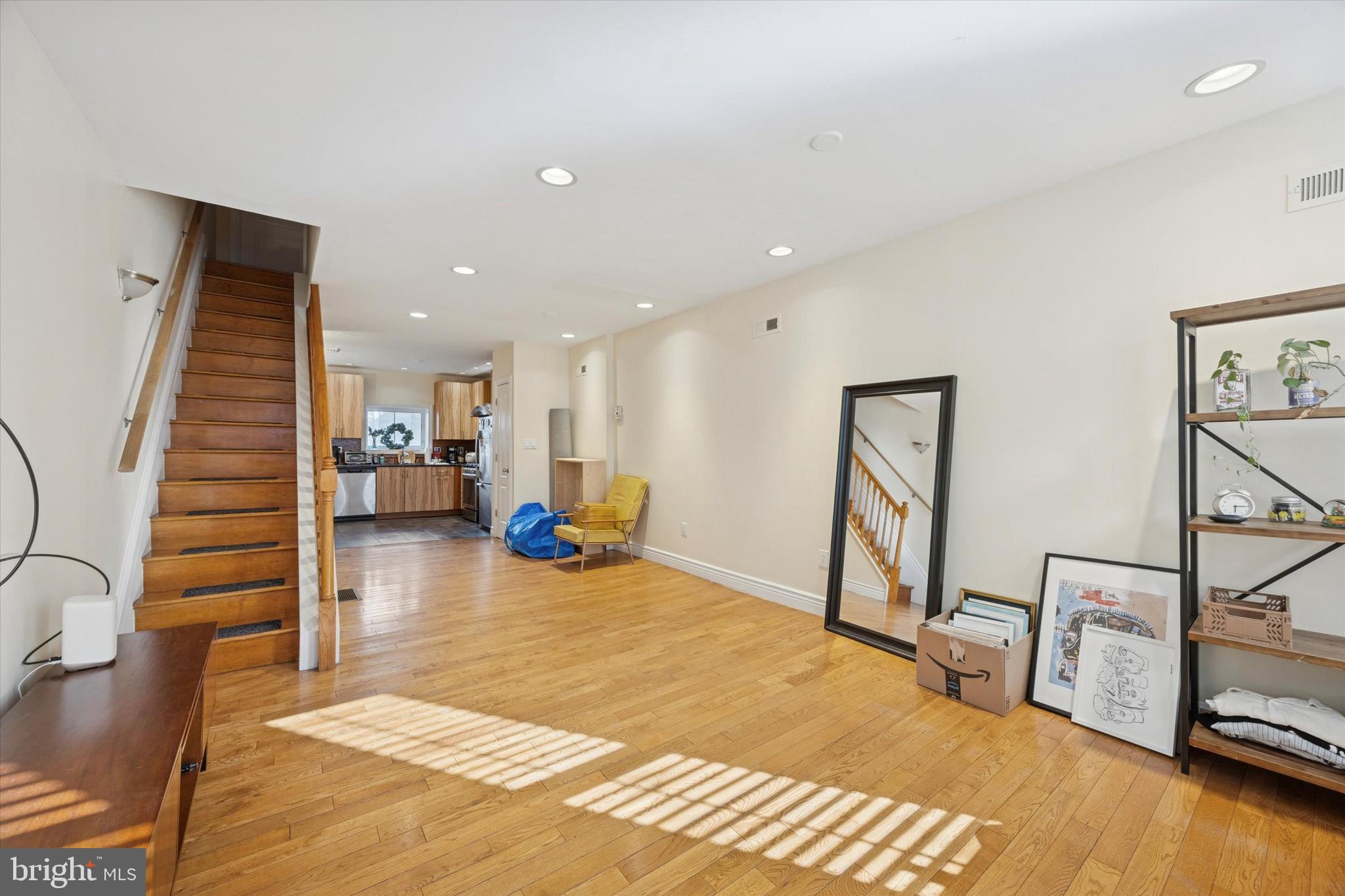 341 Dickinson Street Philadelphia, PA 19147 - Photo 3 of 27 a living room with furniture and a wooden floor