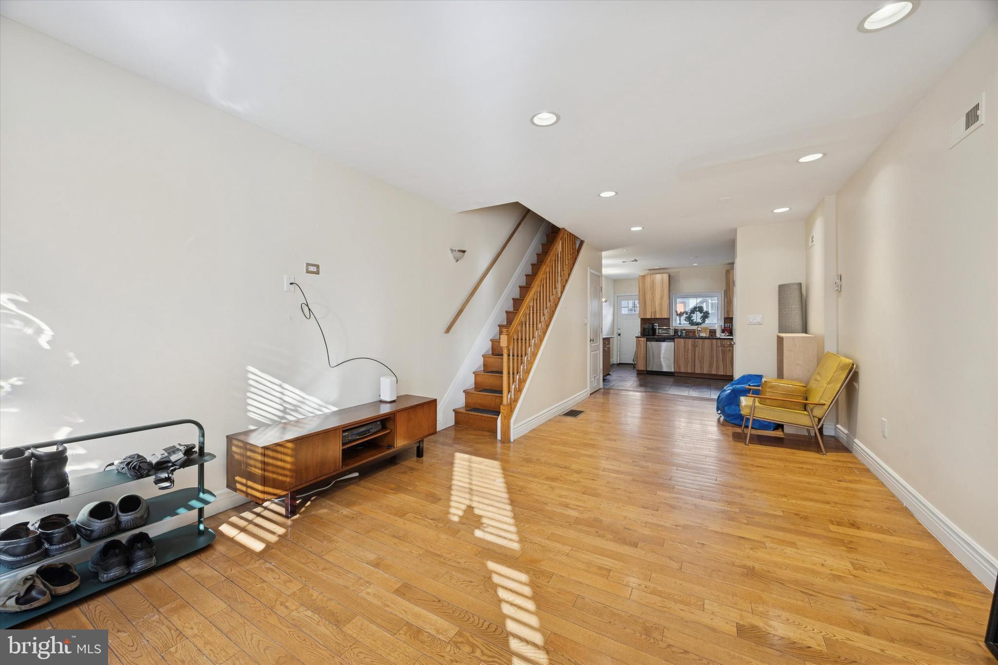 341 Dickinson Street Philadelphia, PA 19147 - Photo 4 of 27 a living room with furniture and a wooden floor