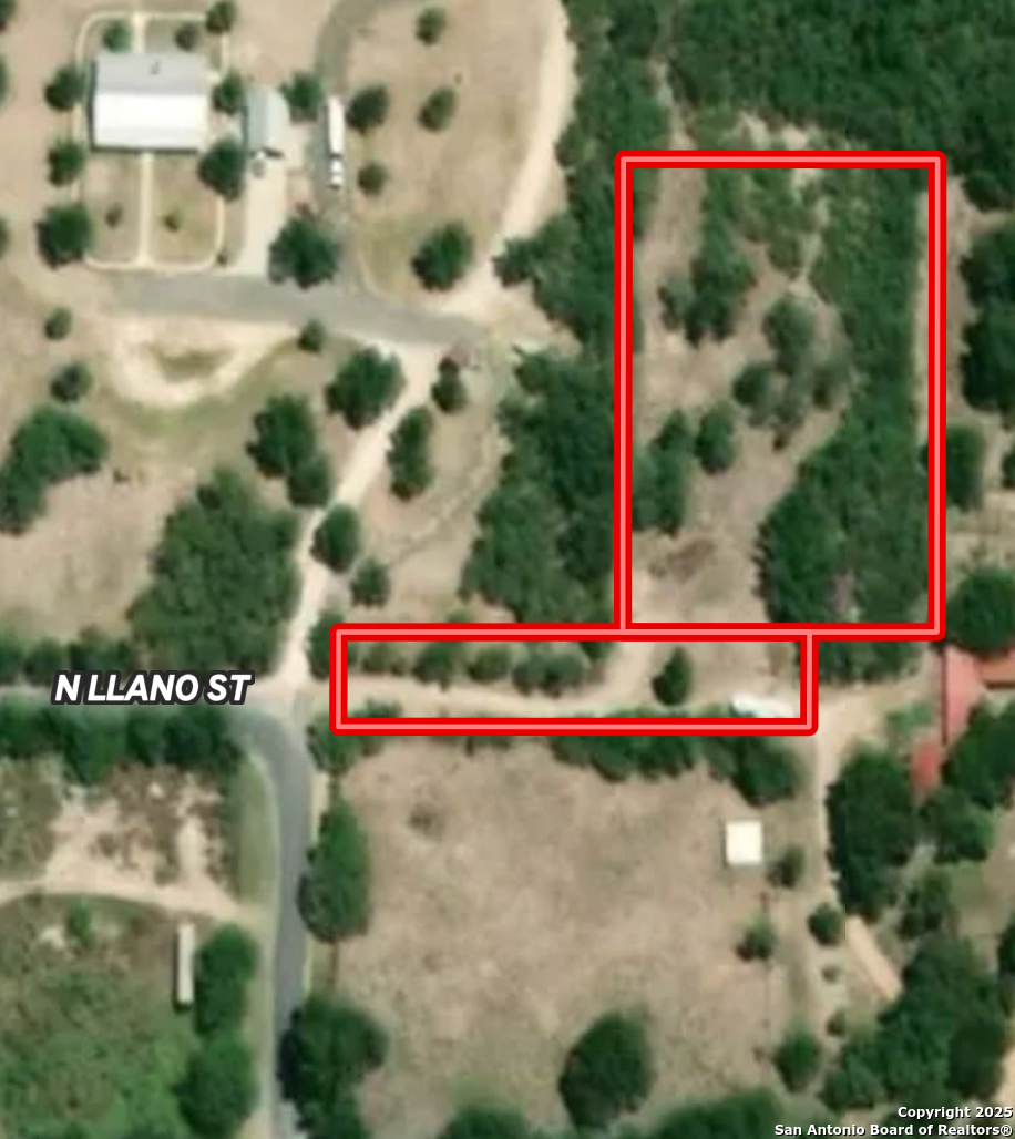 402 North Llano Street Junction, TX 76849 - Photo 2 of 8 a view of swimming pool and red