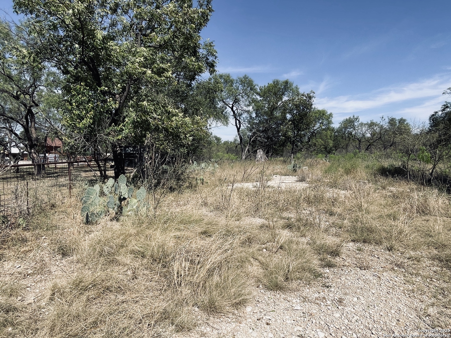 402 North Llano Street Junction, TX 76849 - Photo 4 of 8 a view of swimming pool with a yard