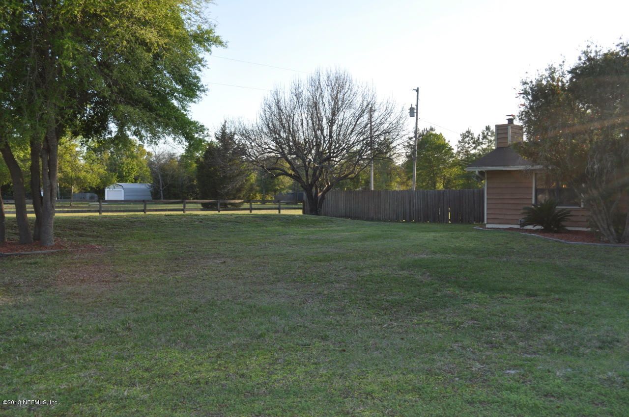 1682 Long Horn Road Middleburg, FL 32068 - Photo 40 of 53 frontsideyard
