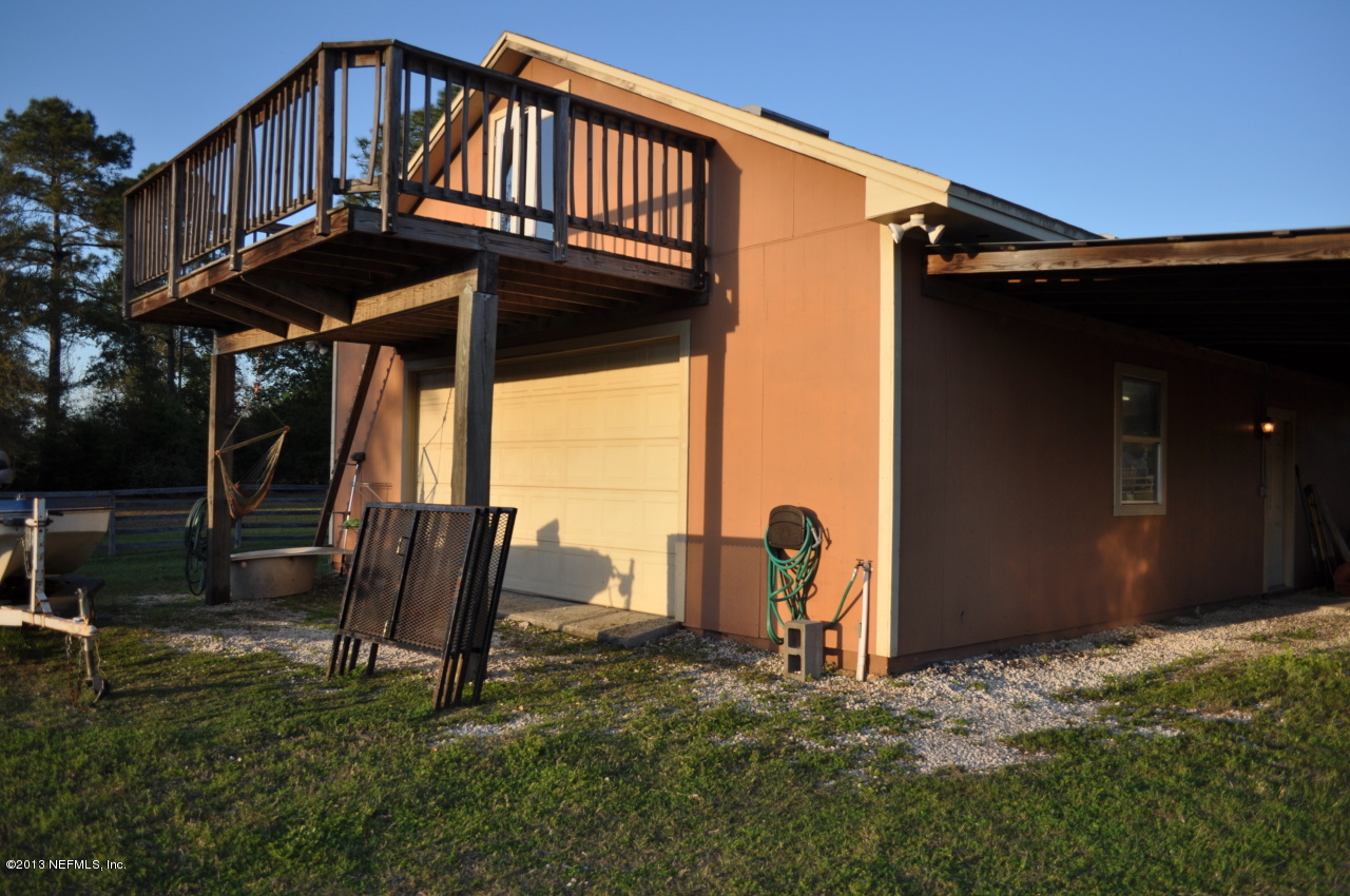 1682 Long Horn Road Middleburg, FL 32068 - Photo 46 of 53 backviewgarage