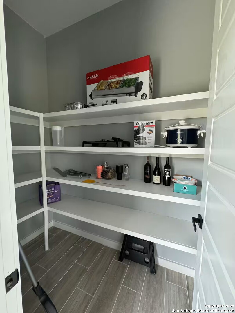 1652 Rimrock Cove Spring Branch, TX 78070 - Photo 20 of 26 a room with storage and utility