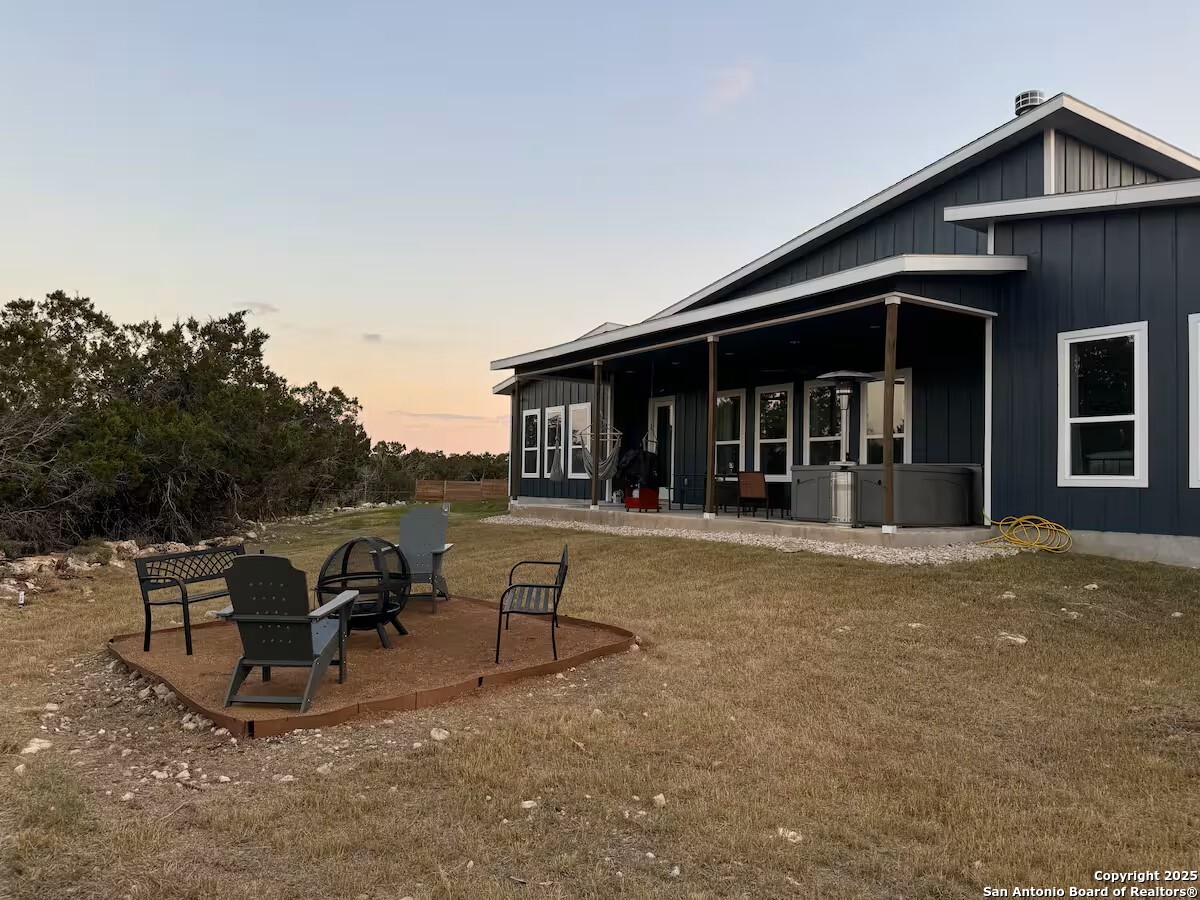 1652 Rimrock Cove Spring Branch, TX 78070 - Photo 25 of 26 a view of a house with patio