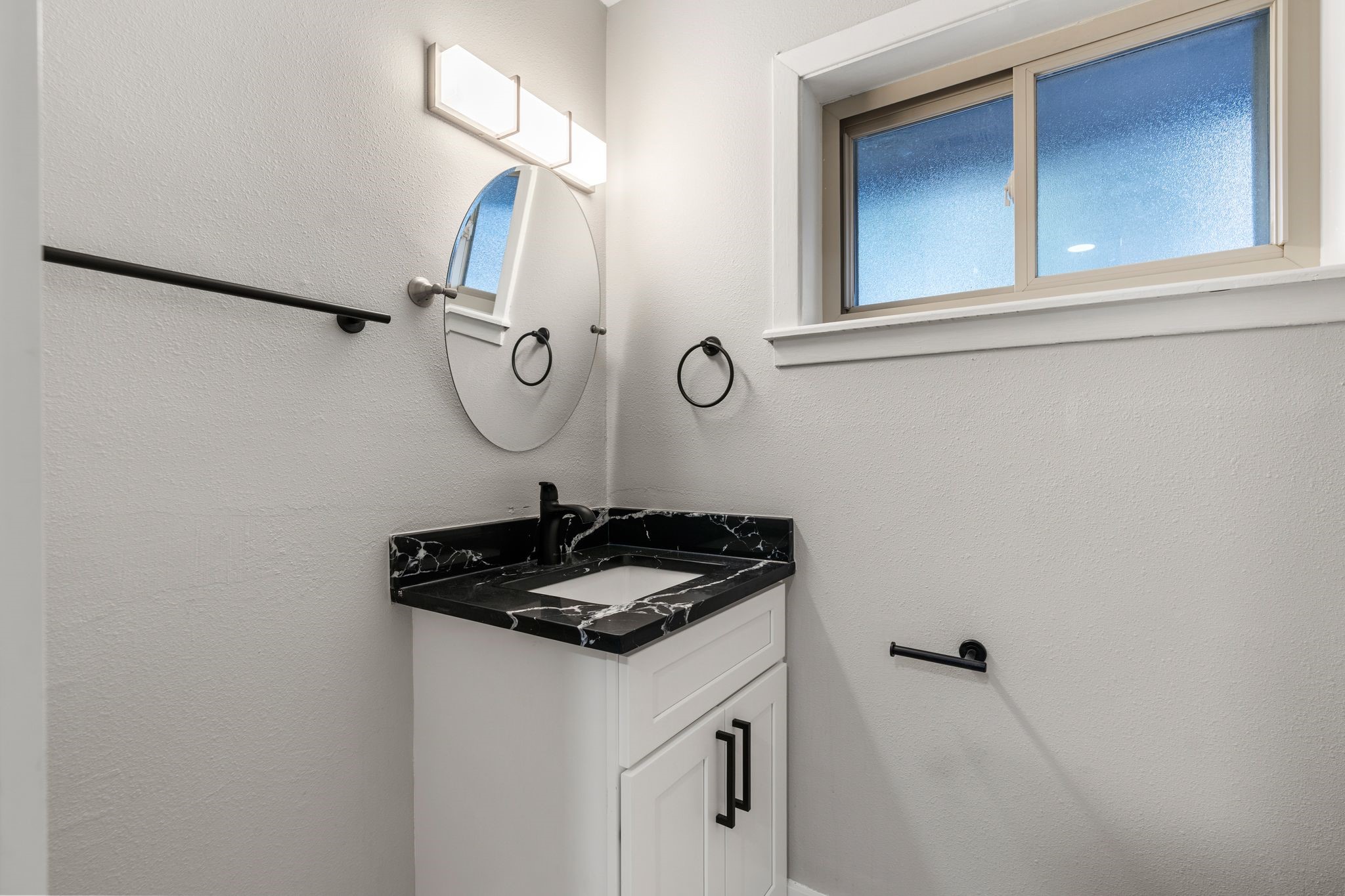 4423 Apollo Street Houston, TX 77018 - Photo 23 of 34 Guest ready half bath with sleek finishes and clean modern design.