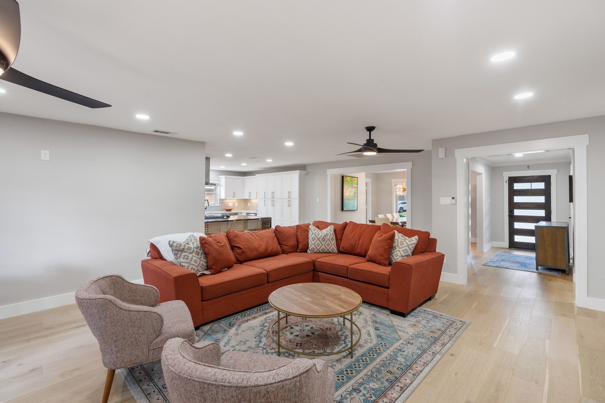 4423 Apollo Street Houston, TX 77018 - Photo 3 of 34 The living room is the center of the home with sight lines of formal dining space, kitchen and breakfast nook. Neutral colors and classic white oak floors provide a blank slate for any style.