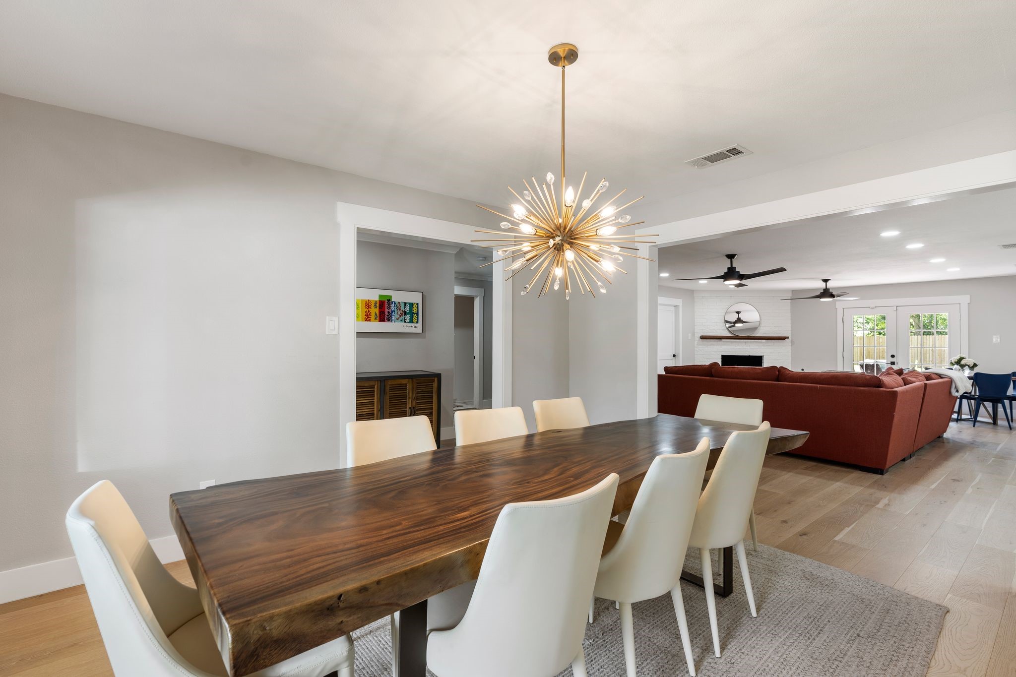 4423 Apollo Street Houston, TX 77018 - Photo 6 of 34 Just off the foyer, you’ll find a stunning formal dining room featuring white oak floors and a neutral color palette, The perfect setting for both everyday meals and special gatherings.