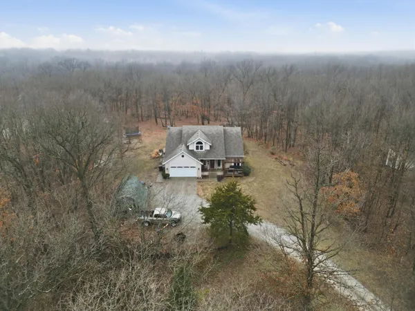 a view of a houses with a yard