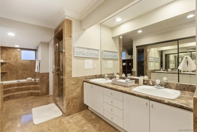 a view of roof deck with ocean view