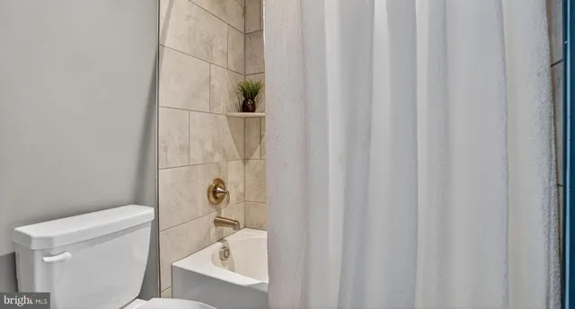 a view of livingroom with furniture and stairs