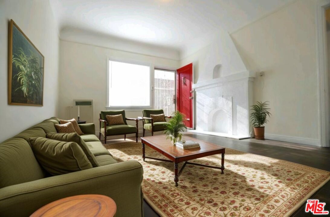 4124 Monroe Street Los Angeles, CA 90029 - Photo 14 of 29 a living room with furniture and a rug
