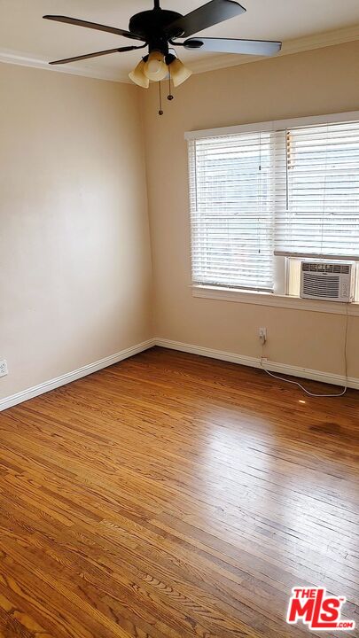 4124 Monroe Street Los Angeles, CA 90029 - Photo 8 of 29 a view of an empty room with wooden floor and a window