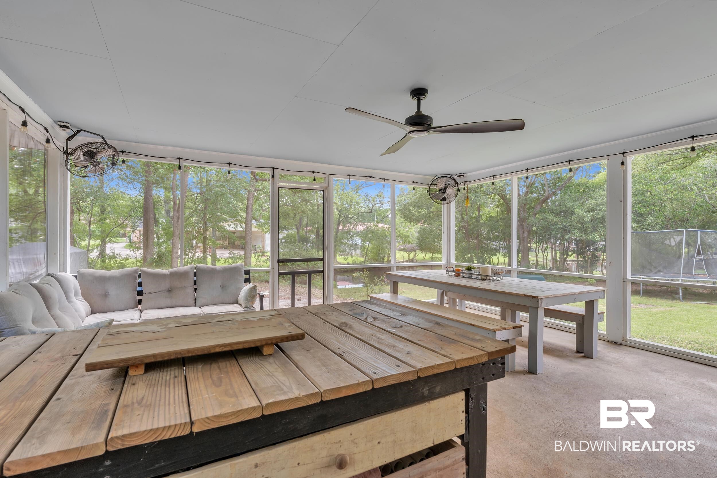 224 Cache Circle Mobile, AL 36611 - Photo 27 of 42 Sunroom / solarium with ceiling fan, healthy amount of natural light, and an outdoor hangout area