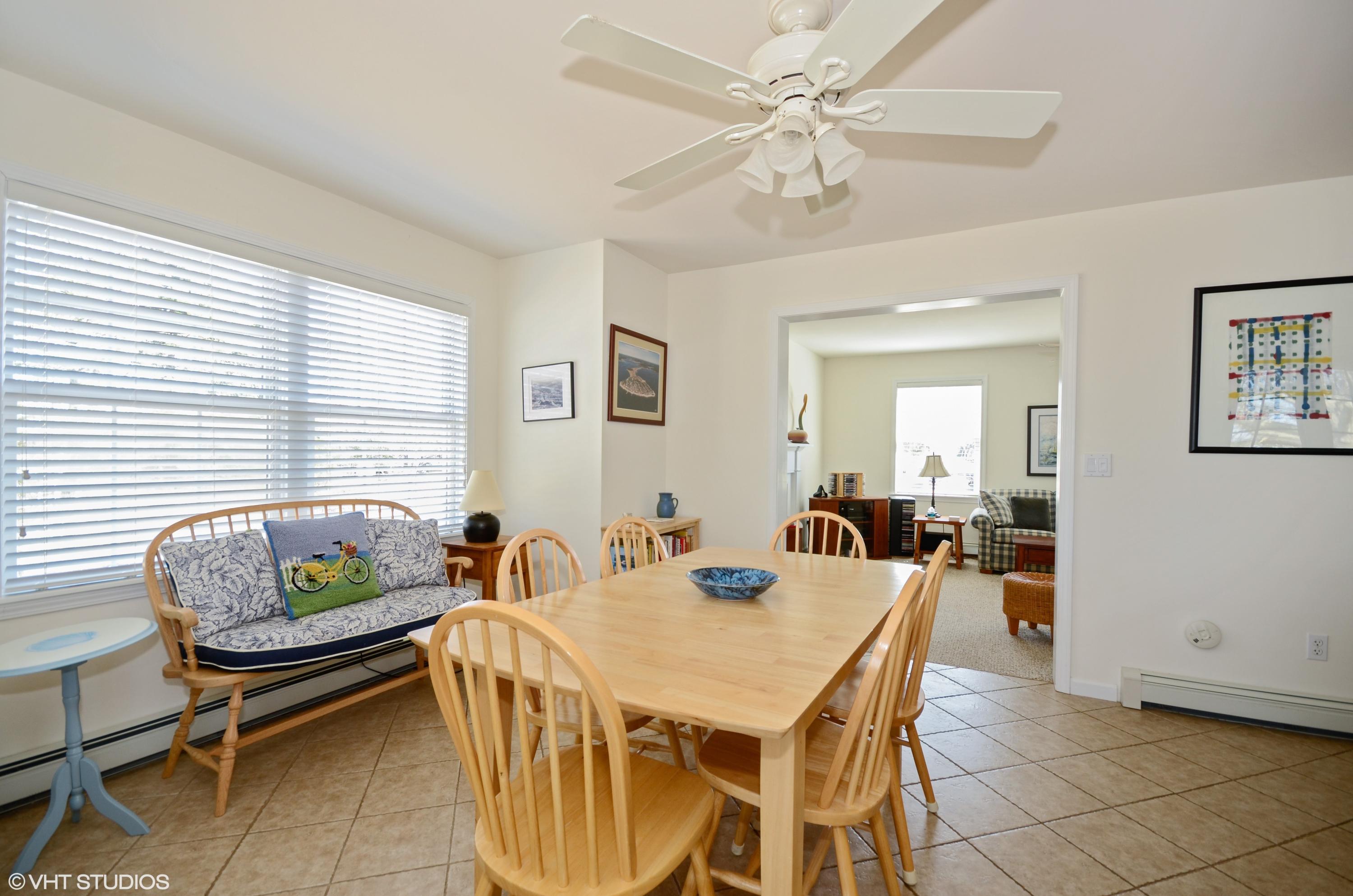 99 Mashnee Road Bourne, MA 02532 - Photo 11 of 25 a dining room with furniture and window