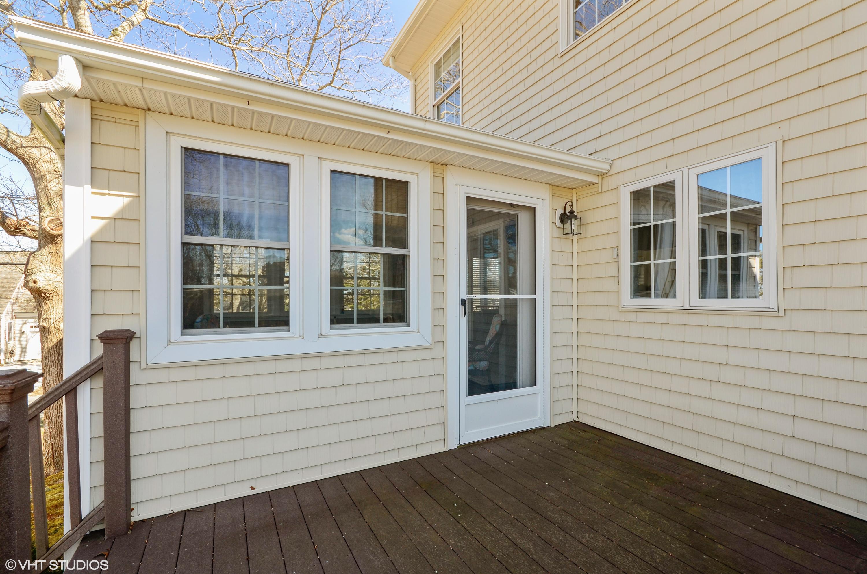 99 Mashnee Road Bourne, MA 02532 - Photo 19 of 25 a view of front door and deck