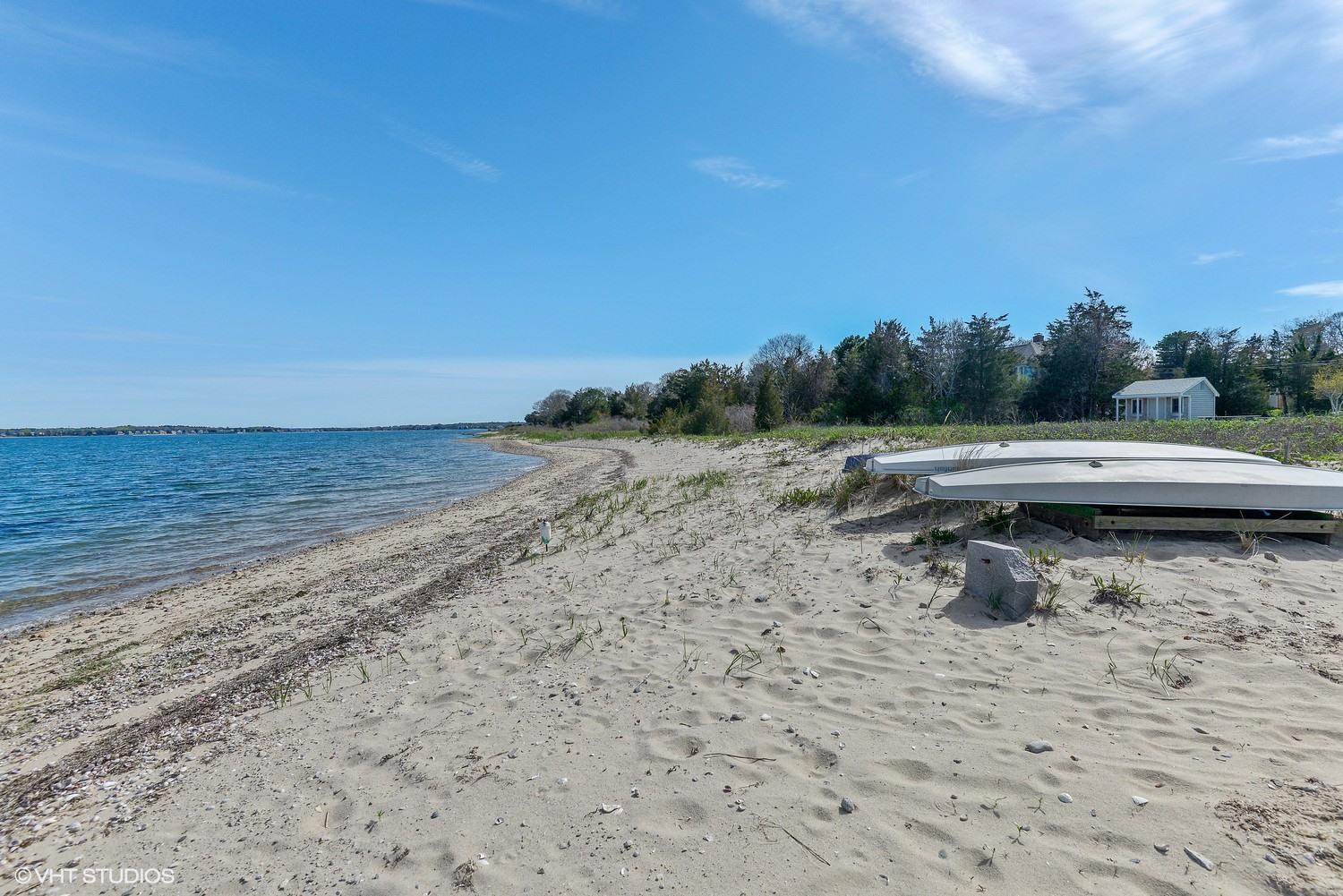 99 Mashnee Road Bourne, MA 02532 - Photo 22 of 25 a view of ocean and beach