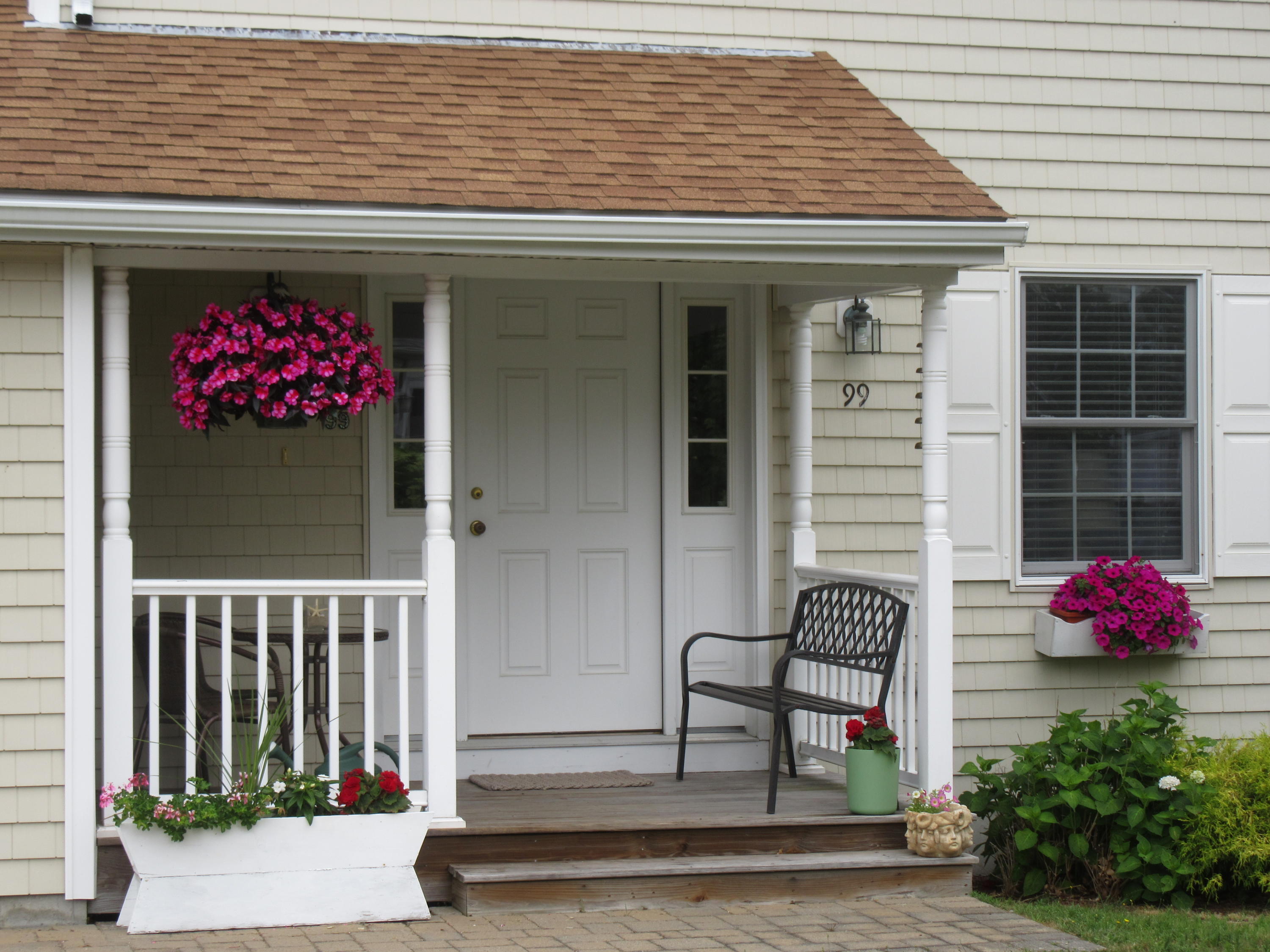 99 Mashnee Road Bourne, MA 02532 - Photo 3 of 25 a front view of a house with entryway