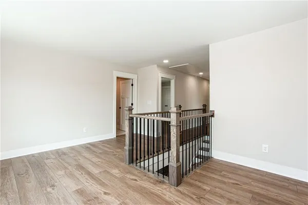 a view of entryway with wooden floor