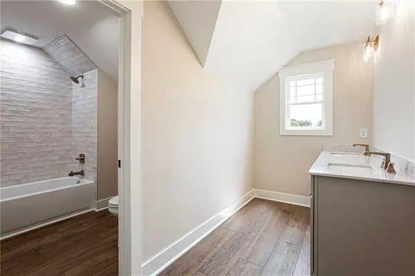 a bathroom with a sink and a bathtub