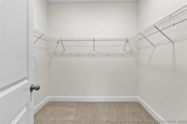 a view of a room with racks on the wall