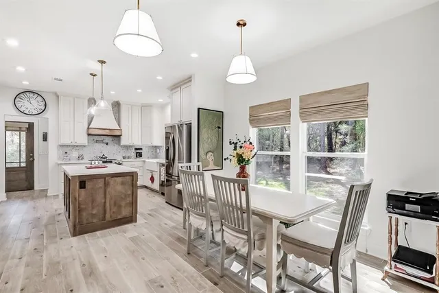 a view of a dining room and chairs in a kitchen