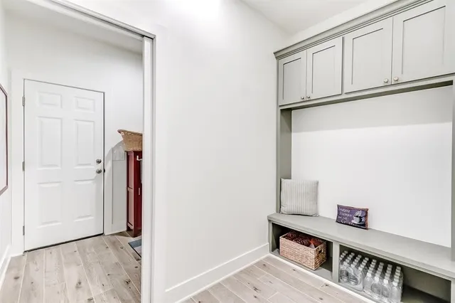 a view of kitchen with furniture and wooden floor