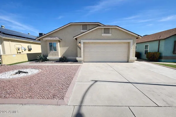 a front view of a house with yard