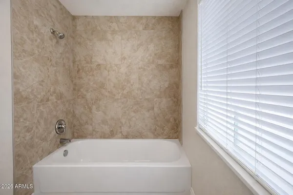 a bathroom with a bathtub