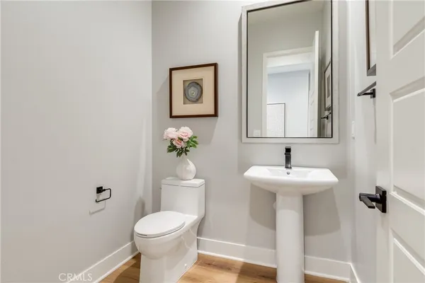 a bedroom with a bed and cabinets