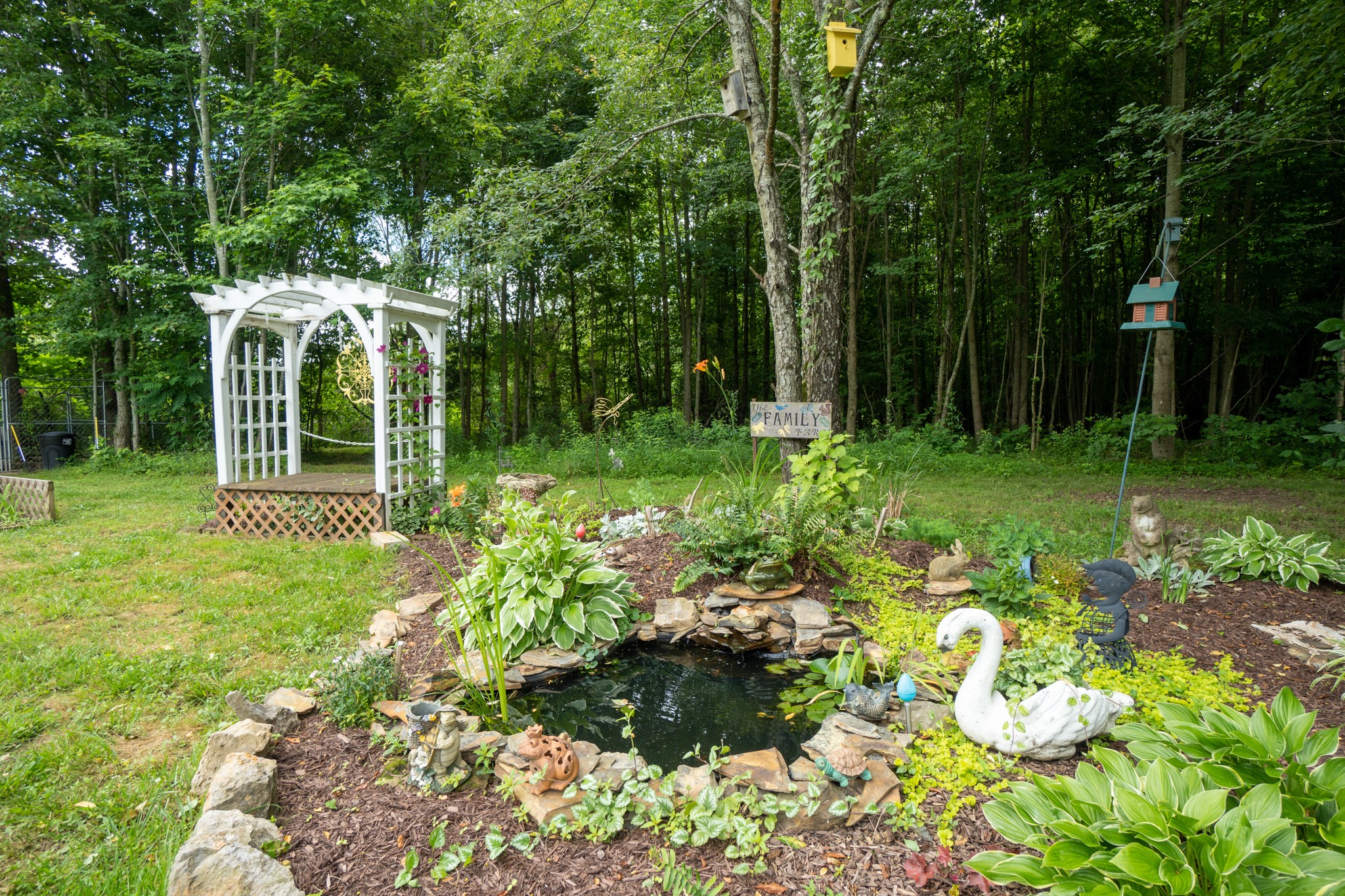 2635 Friendship Road Cross Plains, TN 37049 - Photo 40 of 48 a view of a backyard with a garden