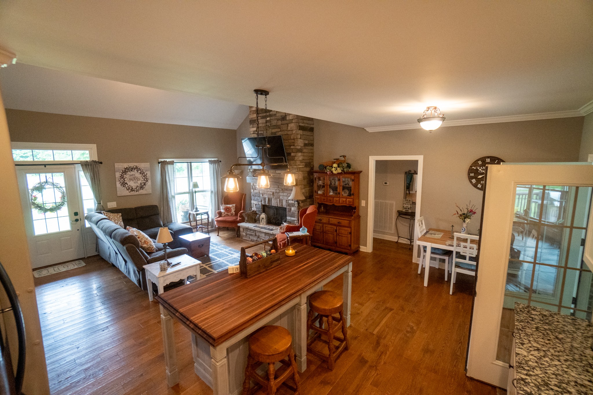 2635 Friendship Road Cross Plains, TN 37049 - Photo 8 of 48 a living room with fireplace furniture and a wooden floor