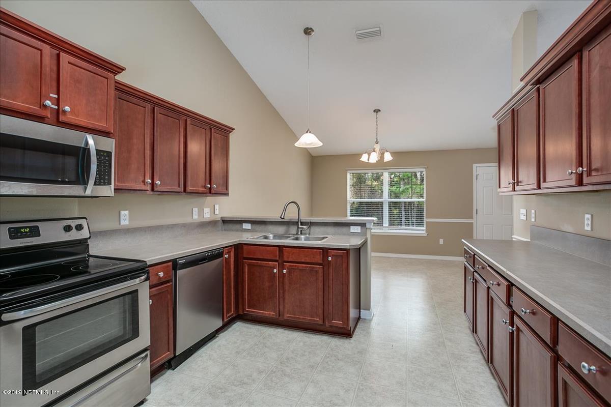 2976 Longleaf Ranch Circle Middleburg, FL 32068 - Photo 8 of 21 08-Kitchen(1)