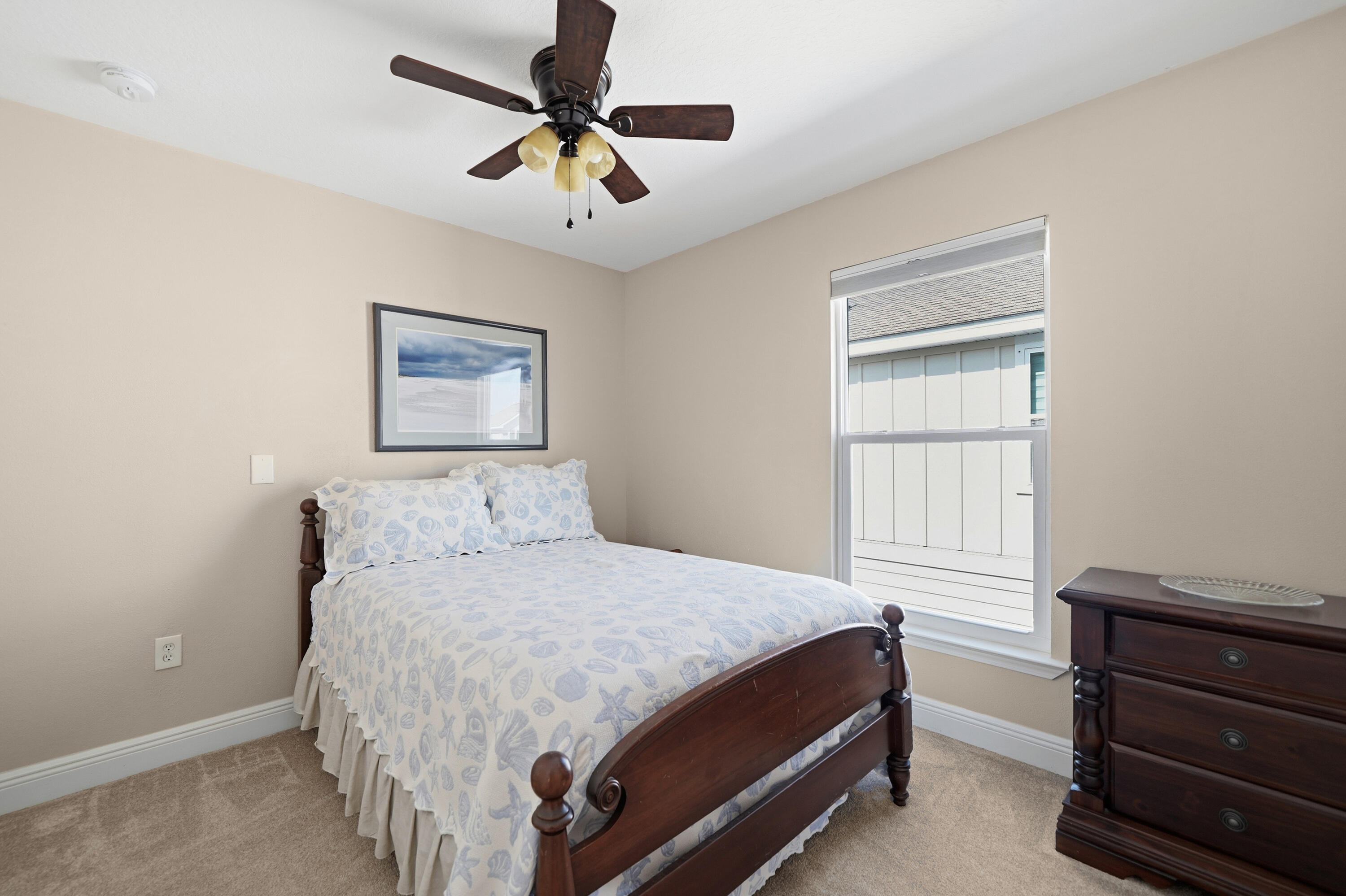 135 Grayling Way Inlet Beach, FL 32461 - Photo 15 of 61 a bedroom with a bed and a window