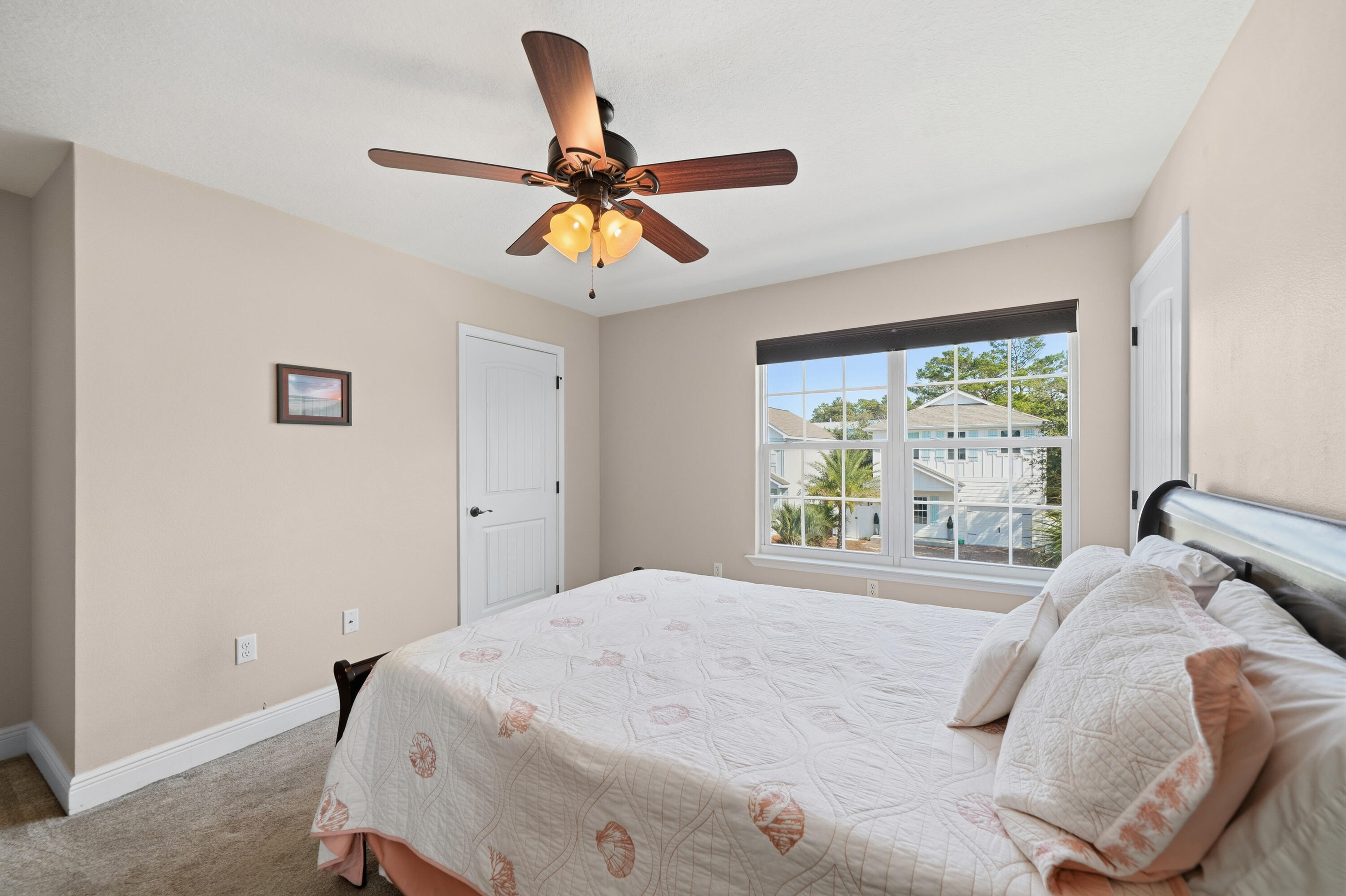 135 Grayling Way Inlet Beach, FL 32461 - Photo 21 of 61 a bedroom with a large bed and a window