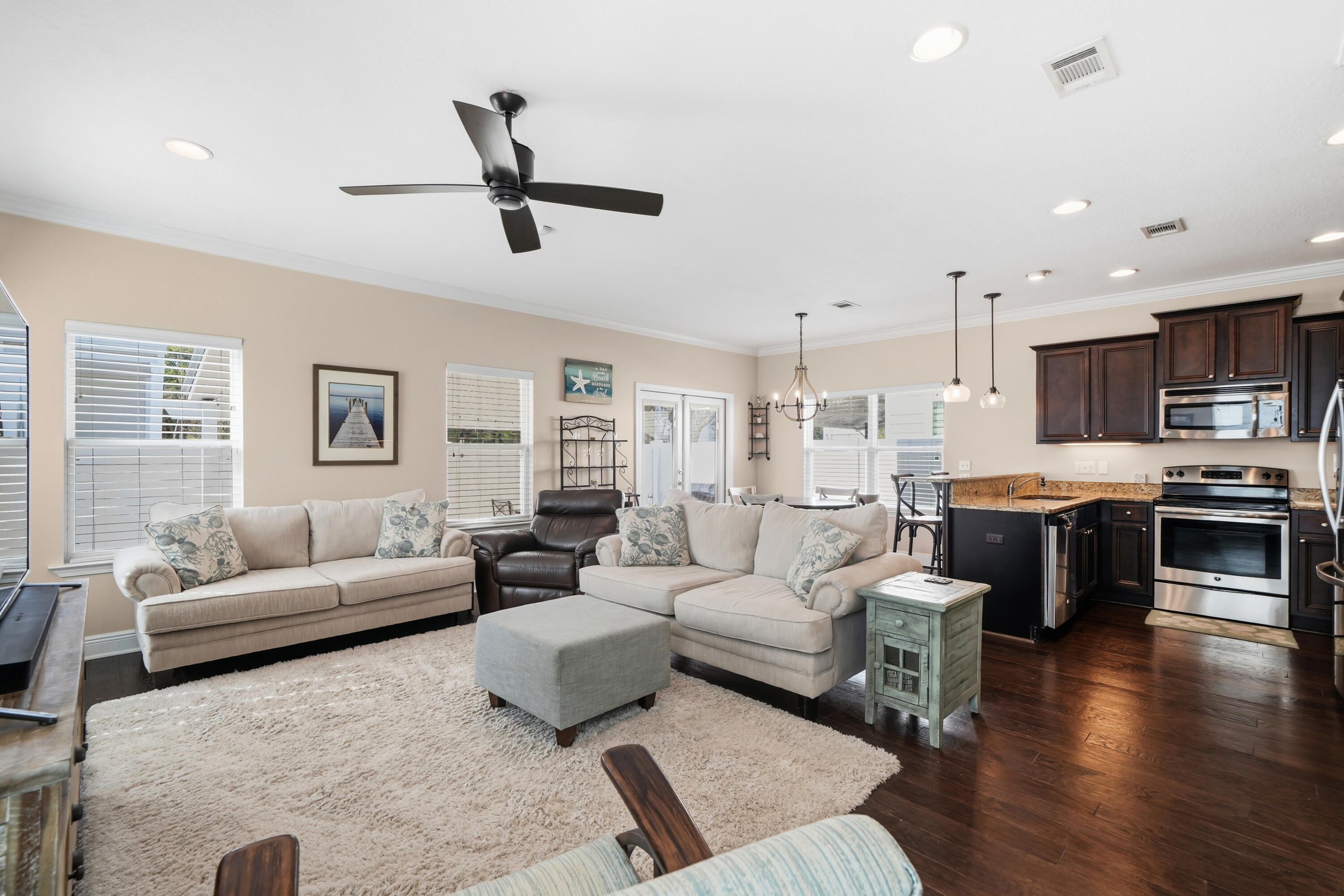 135 Grayling Way Inlet Beach, FL 32461 - Photo 28 of 61 a living room with furniture kitchen area and a window