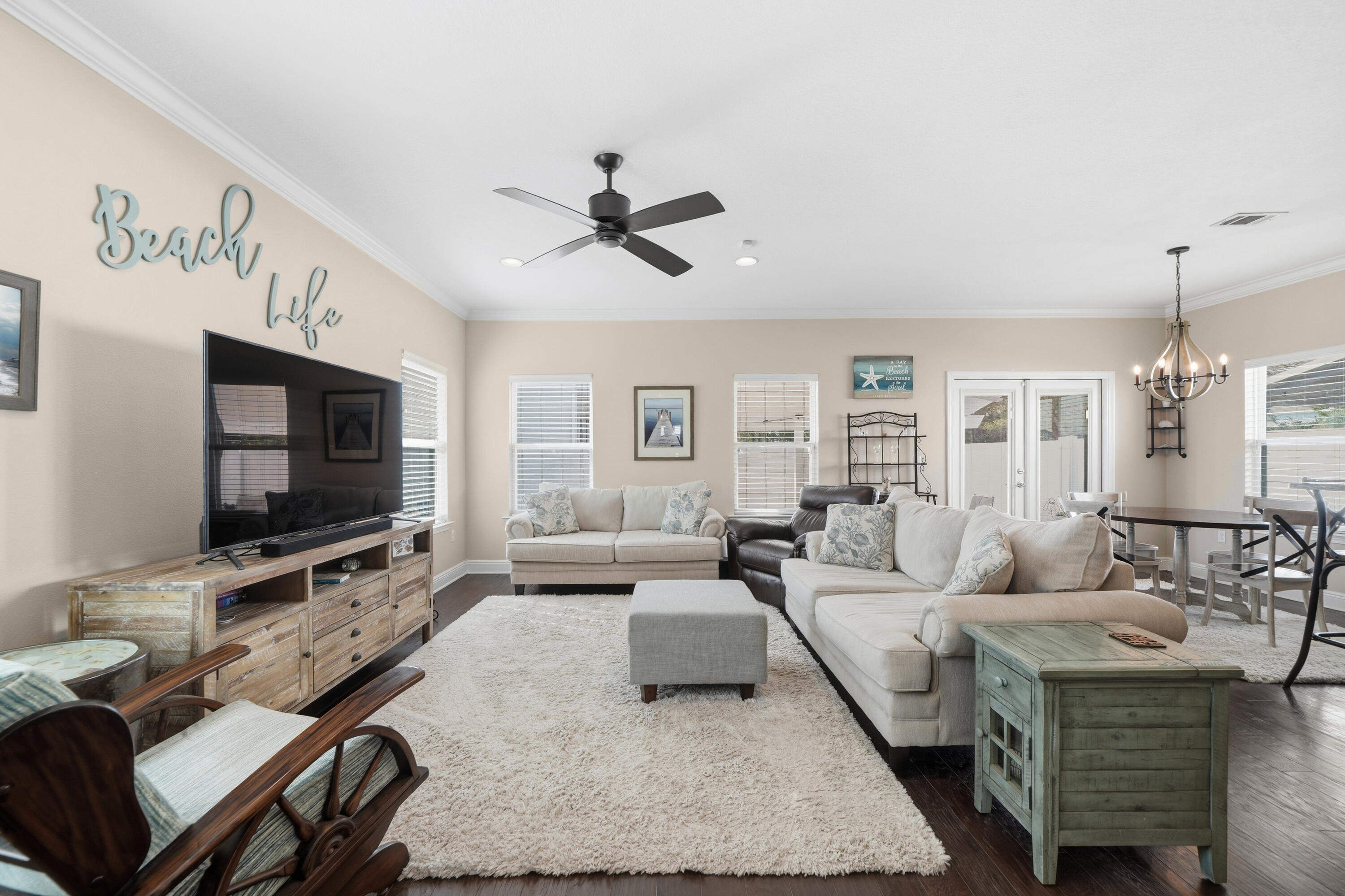 135 Grayling Way Inlet Beach, FL 32461 - Photo 29 of 61 a living room with furniture and a flat screen tv