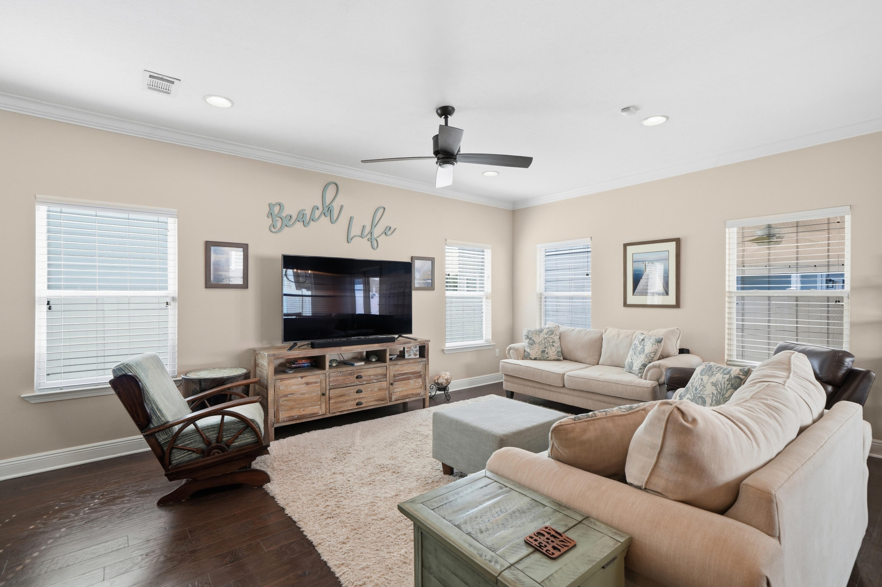 135 Grayling Way Inlet Beach, FL 32461 - Photo 30 of 61 a living room with furniture a flat screen tv and a window