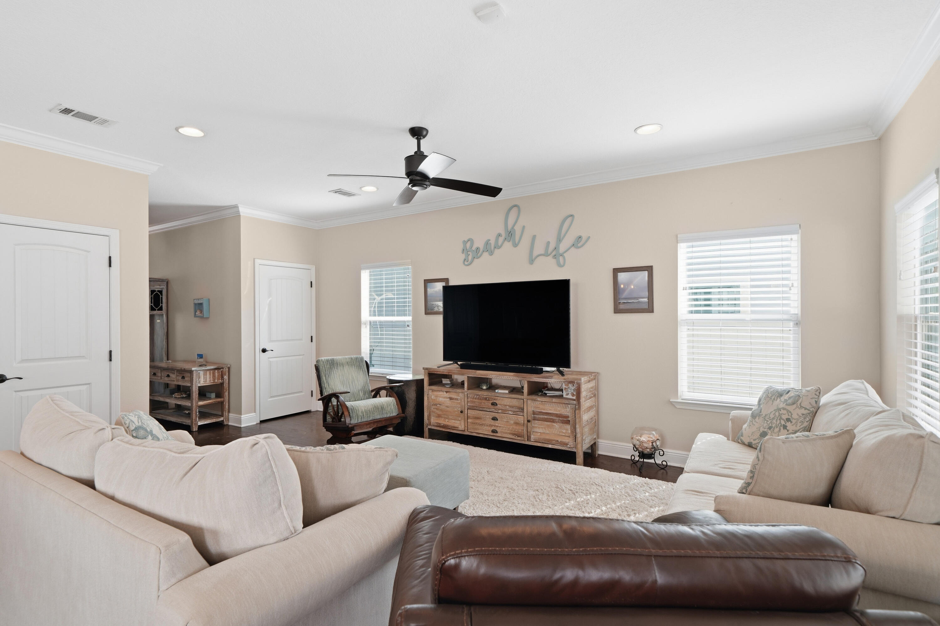 135 Grayling Way Inlet Beach, FL 32461 - Photo 32 of 61 a living room with furniture and a flat screen tv
