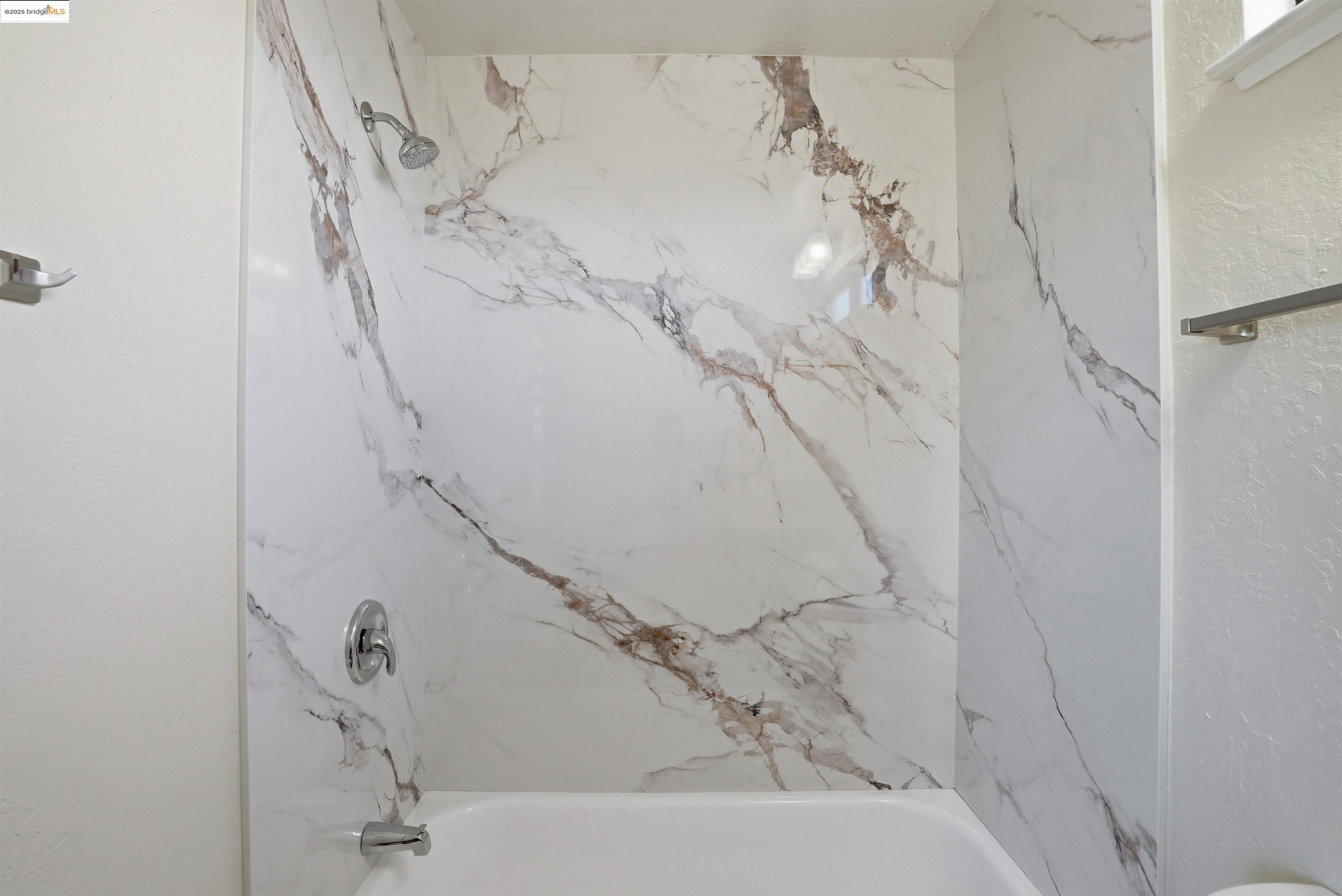 2796 Taylor Road Bethel Island, CA 94511 - Photo 18 of 49 Bathroom view of a combined bath / shower with marble appearance