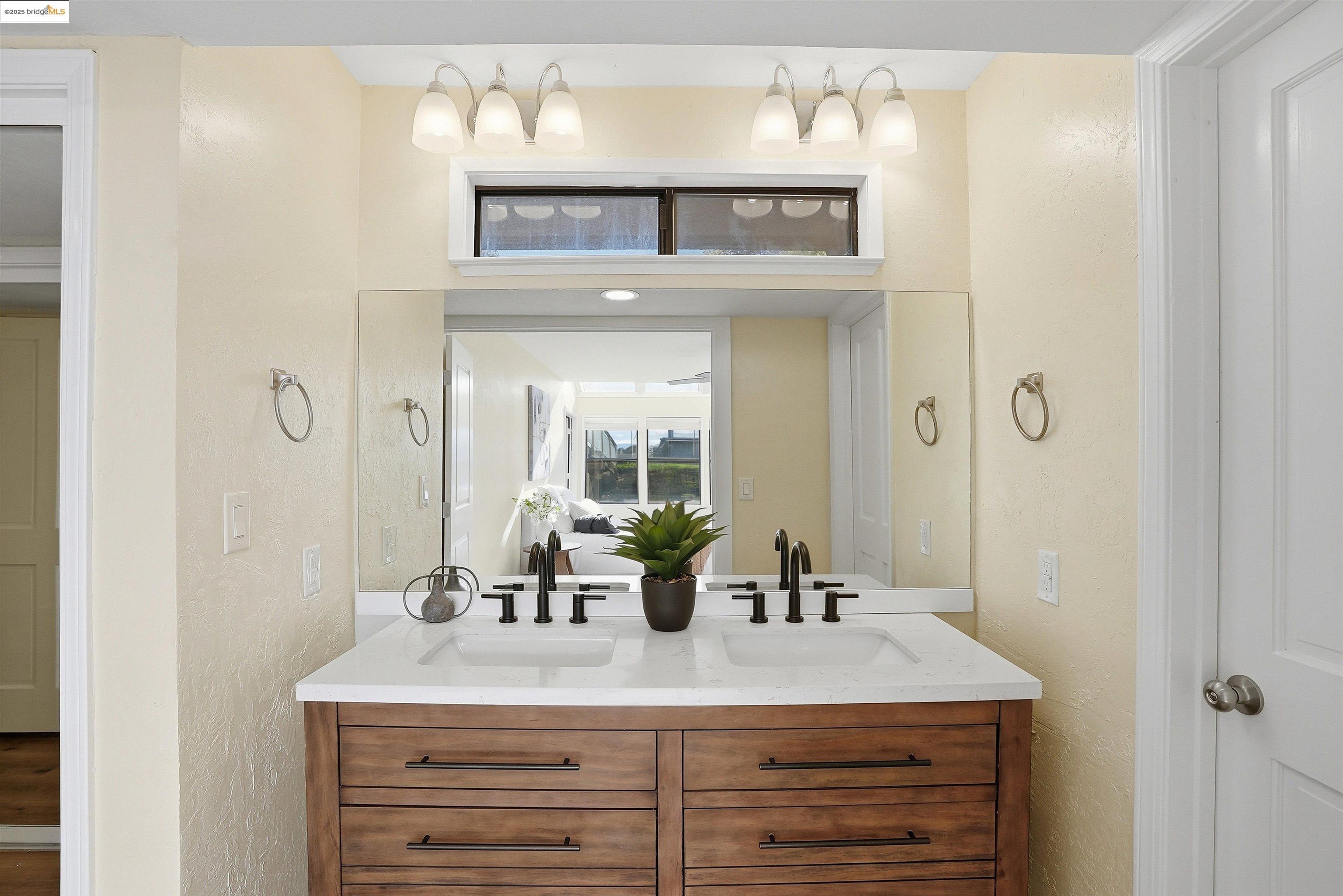 2796 Taylor Road Bethel Island, CA 94511 - Photo 24 of 49 Full bathroom featuring a textured wall and double vanity