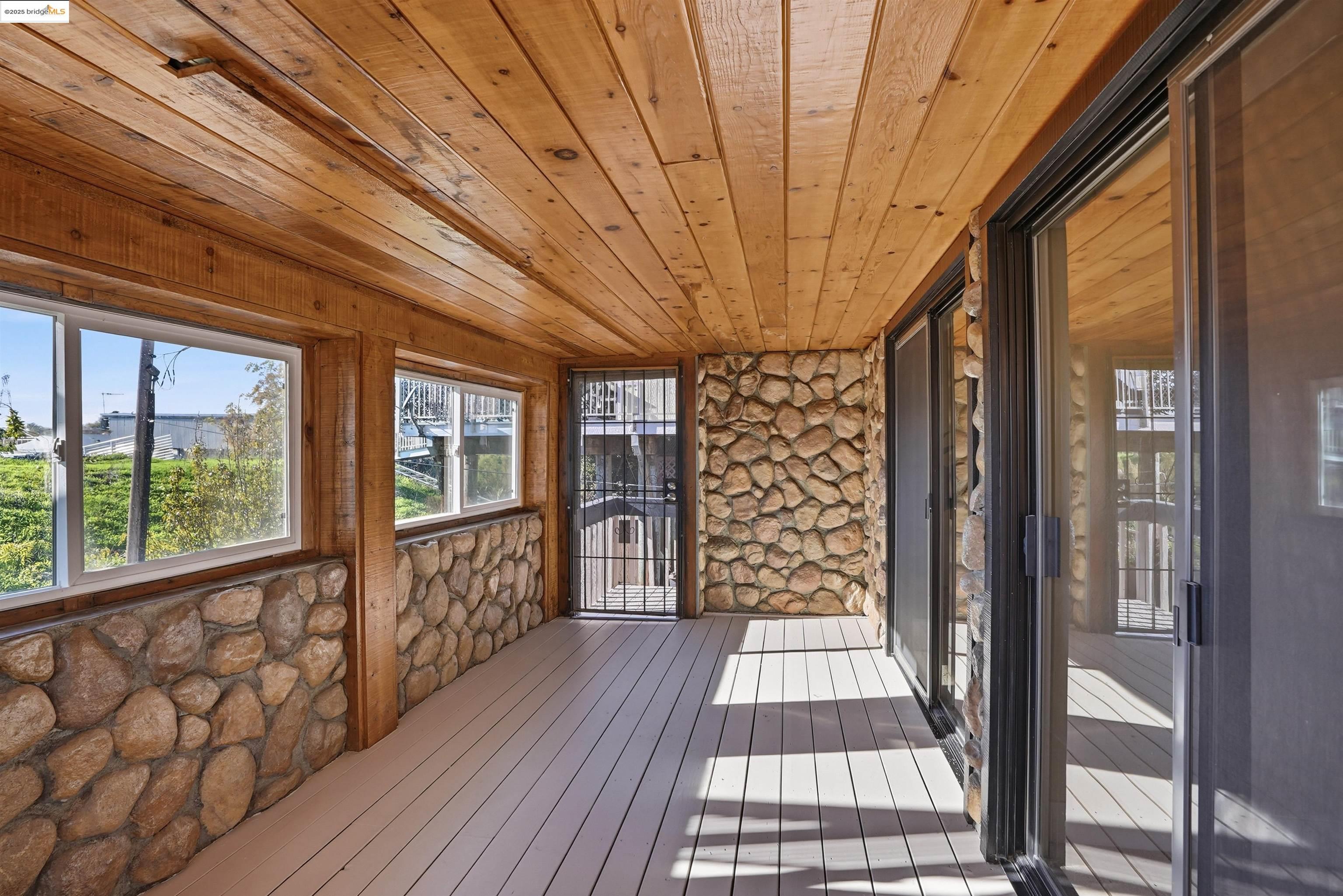 2796 Taylor Road Bethel Island, CA 94511 - Photo 29 of 49 Unfurnished sunroom with a deck