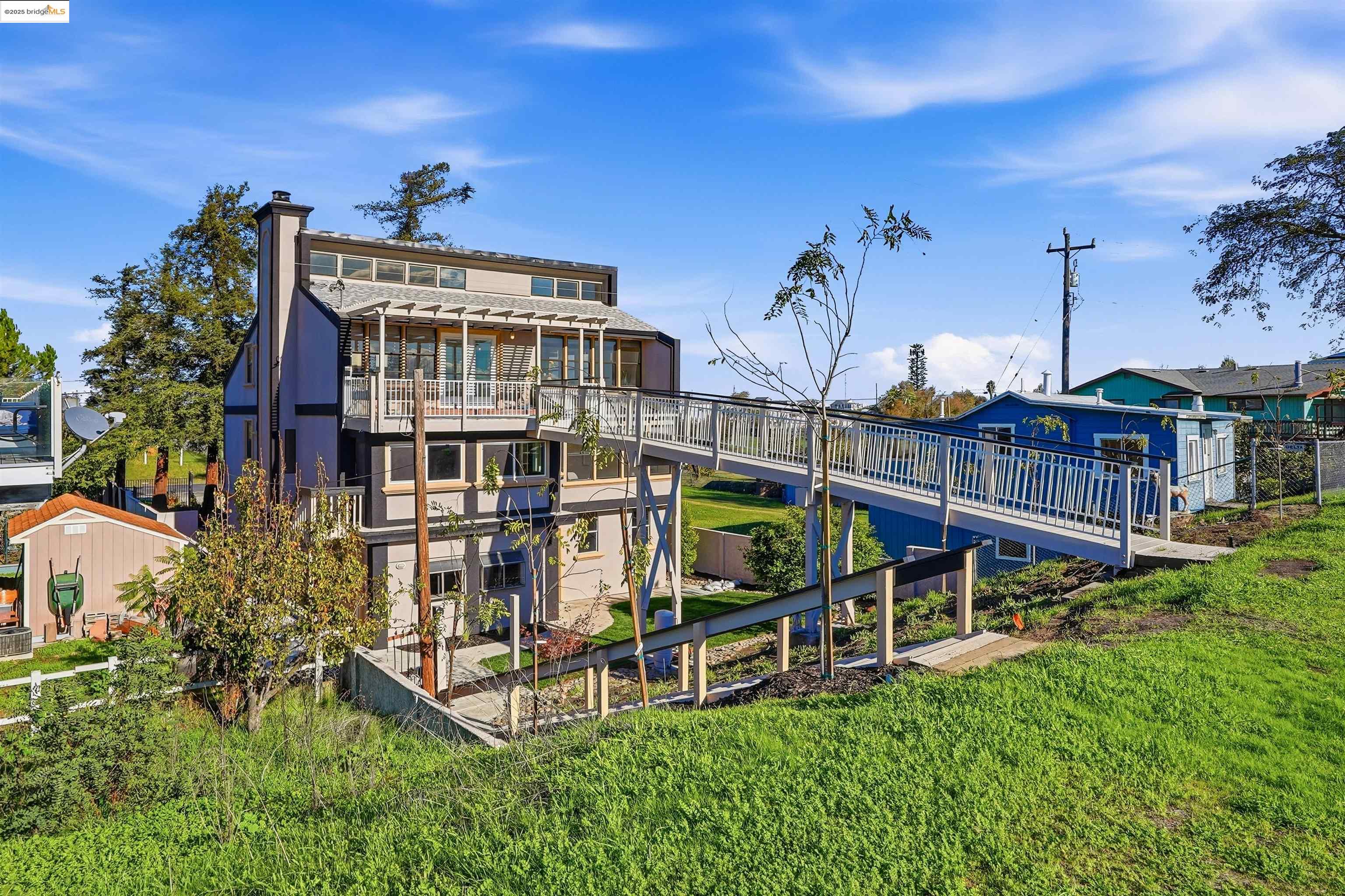 2796 Taylor Road Bethel Island, CA 94511 - Photo 43 of 49 Rear view of property with a chimney and a yard