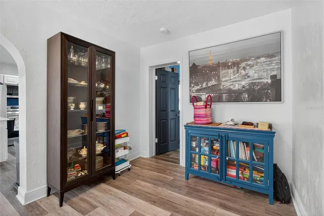 a book shelf with books on the wall
