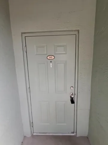 a bathroom with a glass door