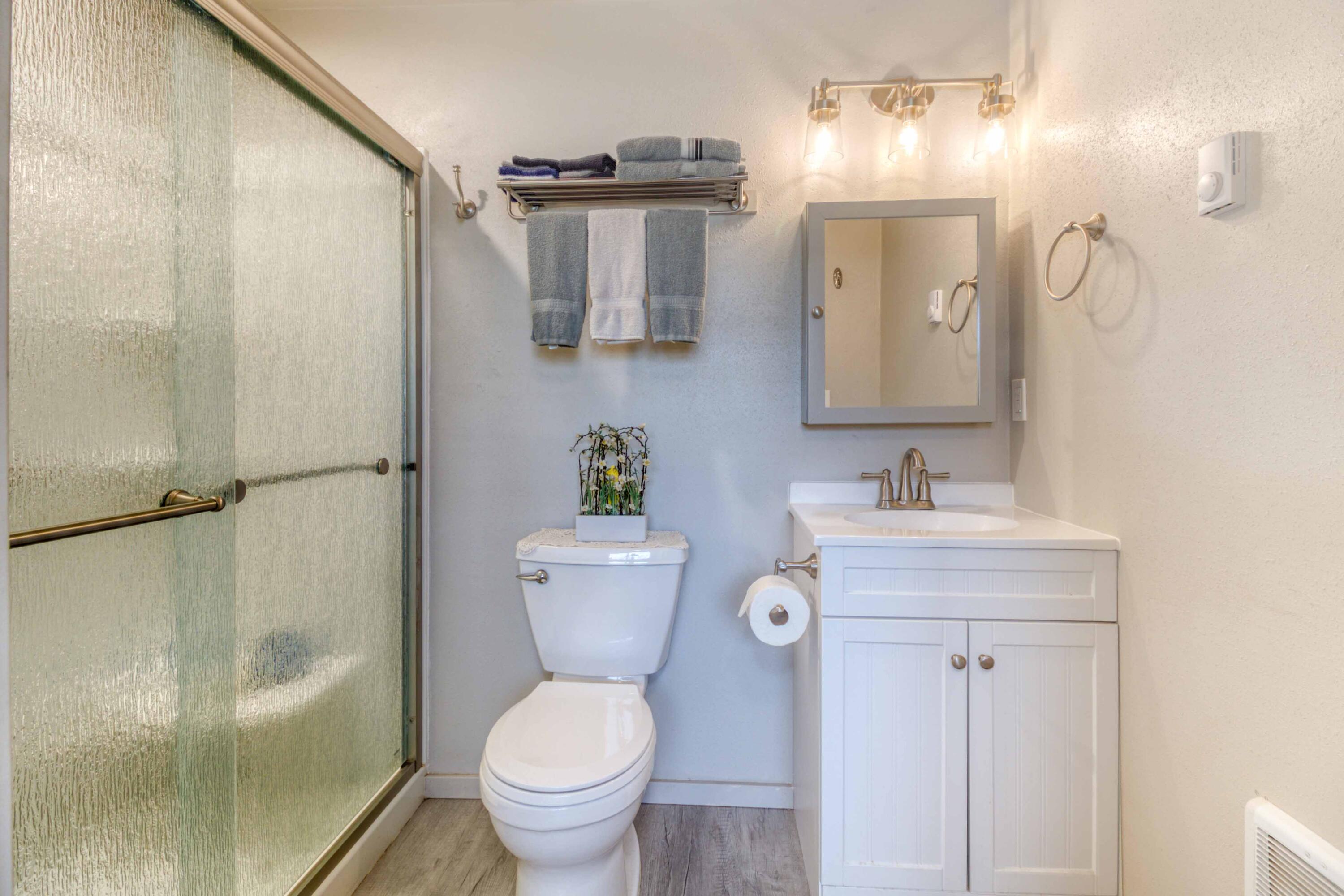566 Northwest Mc Donald Road Prineville, OR 97754 - Photo 13 of 41 a bathroom with a granite countertop sink toilet and shower