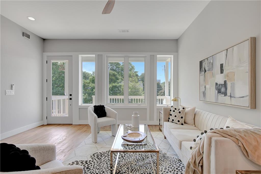 458 Connally Street Southeast Atlanta, GA 30312 - Photo 13 of 51 a living room with furniture and a large window