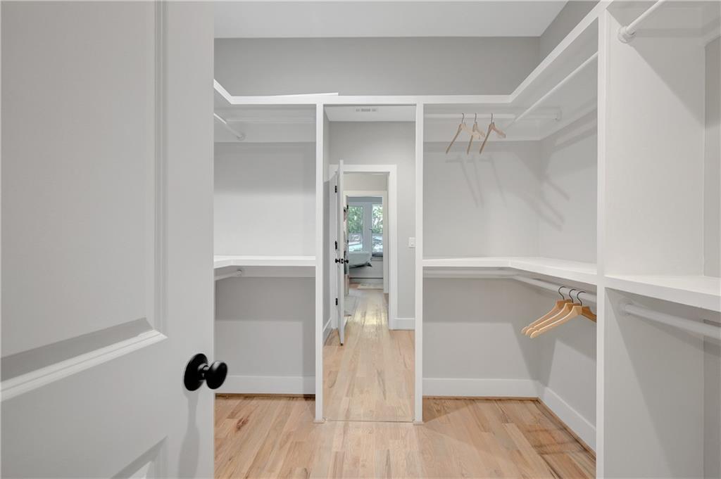 458 Connally Street Southeast Atlanta, GA 30312 - Photo 27 of 51 a view of walk in closet with empty racks