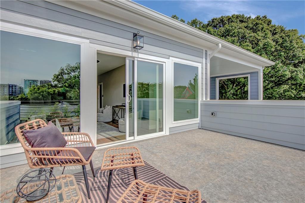 458 Connally Street Southeast Atlanta, GA 30312 - Photo 45 of 51 a balcony with furniture and a potted plant