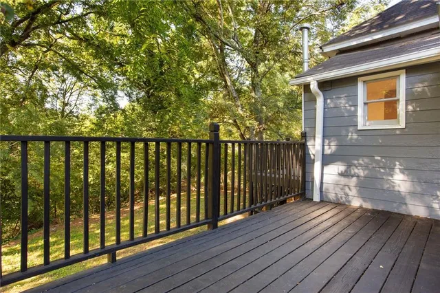 a view of wooden balcony with wooden floor